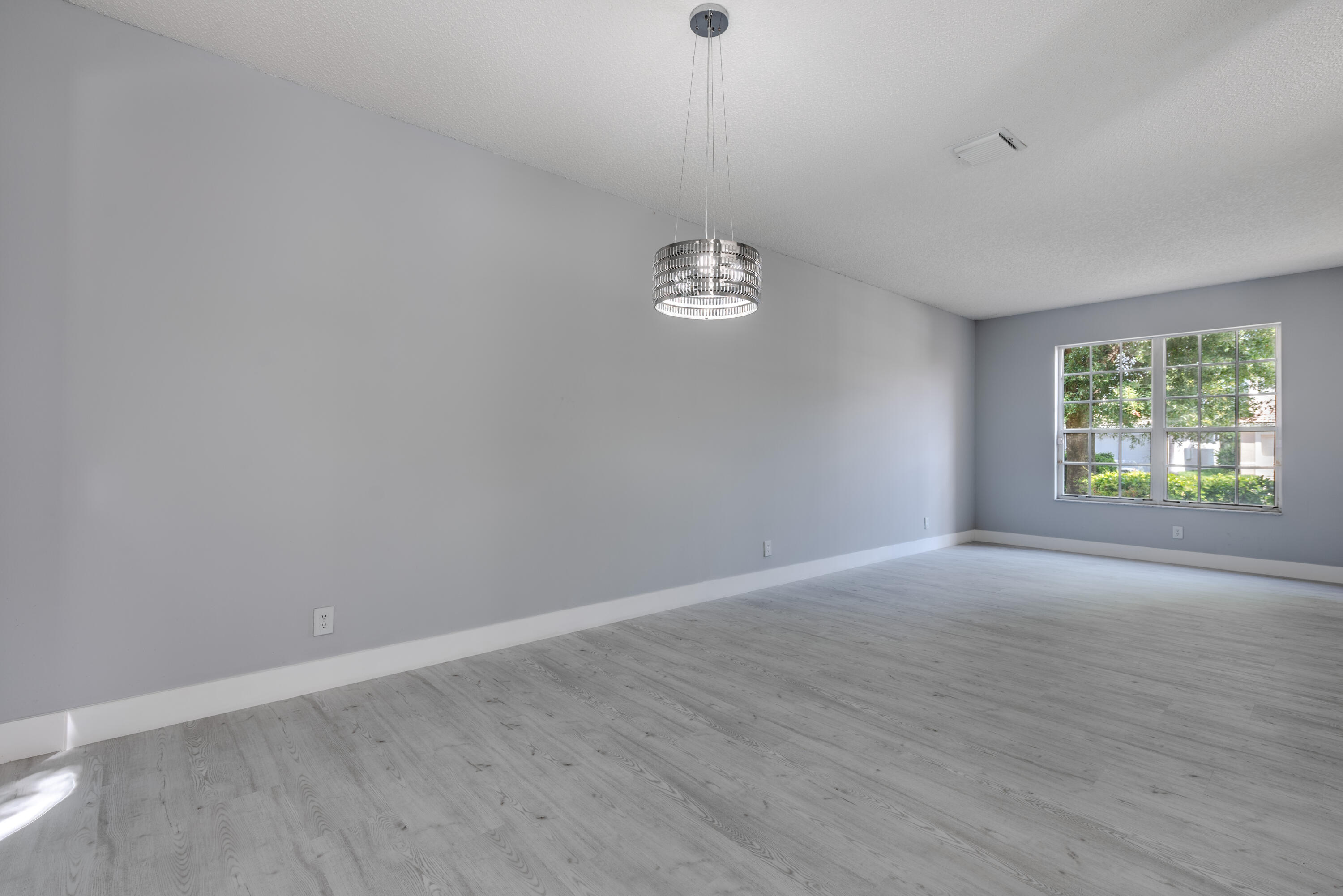 9542 Fox Trot Lane Boca Raton, FL 33496 - Photo 7 of 49 Living/Dining Rm
