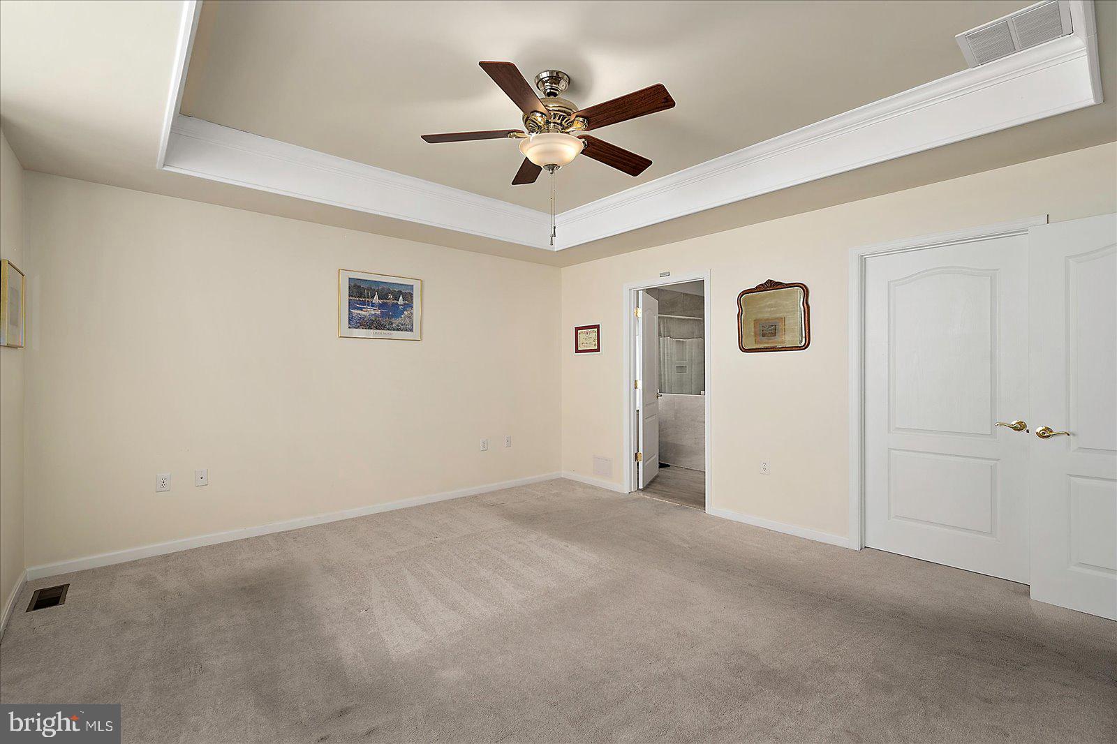 2 Audubon Circle Berlin, MD 21811 - Photo 27 of 71 an empty room with ceiling fan and window