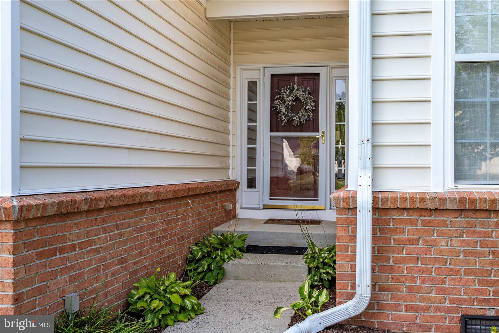 2 Audubon Circle Berlin, MD 21811 - Photo 3 of 71 a front view of a house with a garden