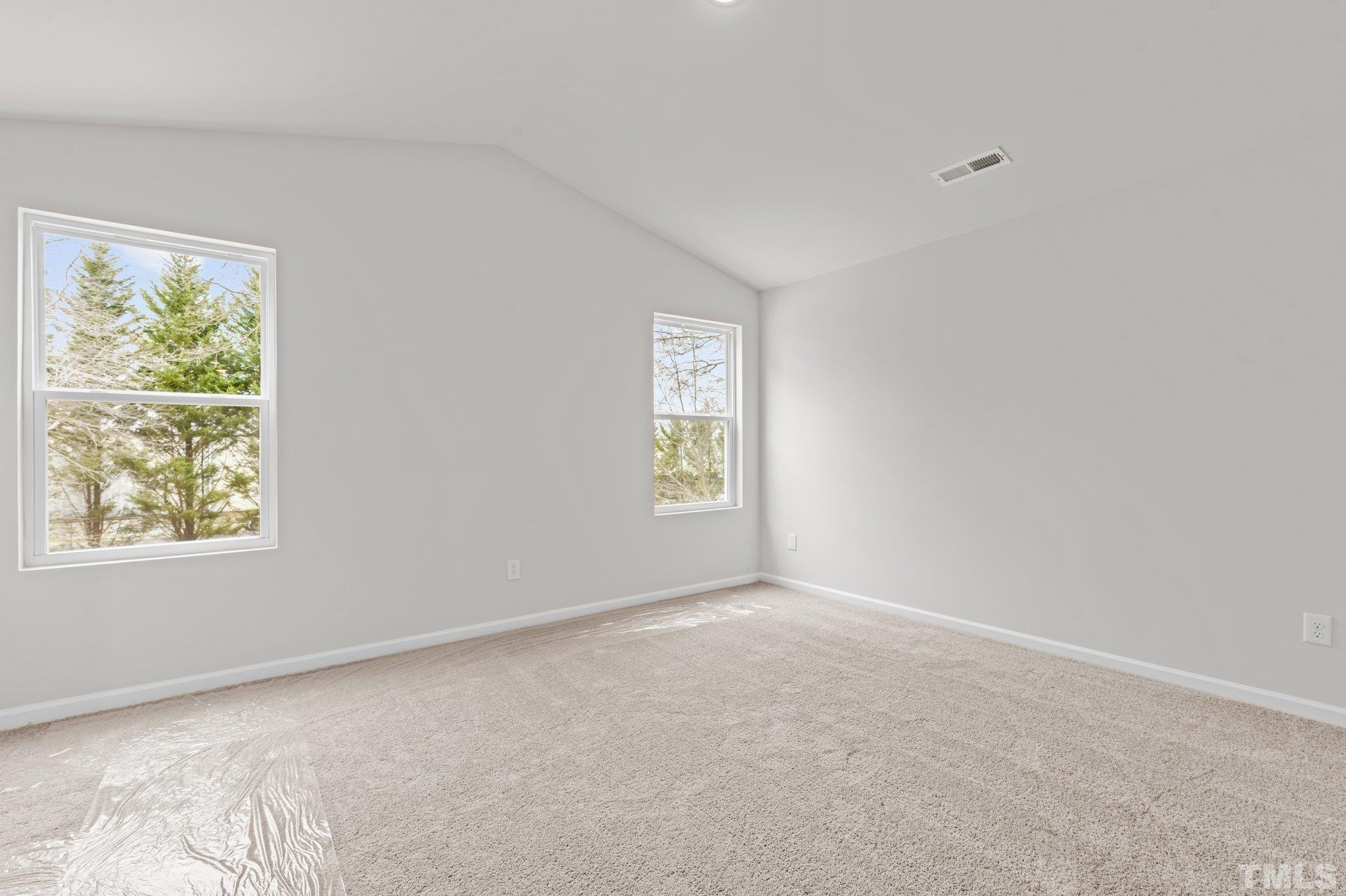 96 Somerset Drive Roxboro, NC 27573 - Photo 21 of 29 a view of an empty room with a window
