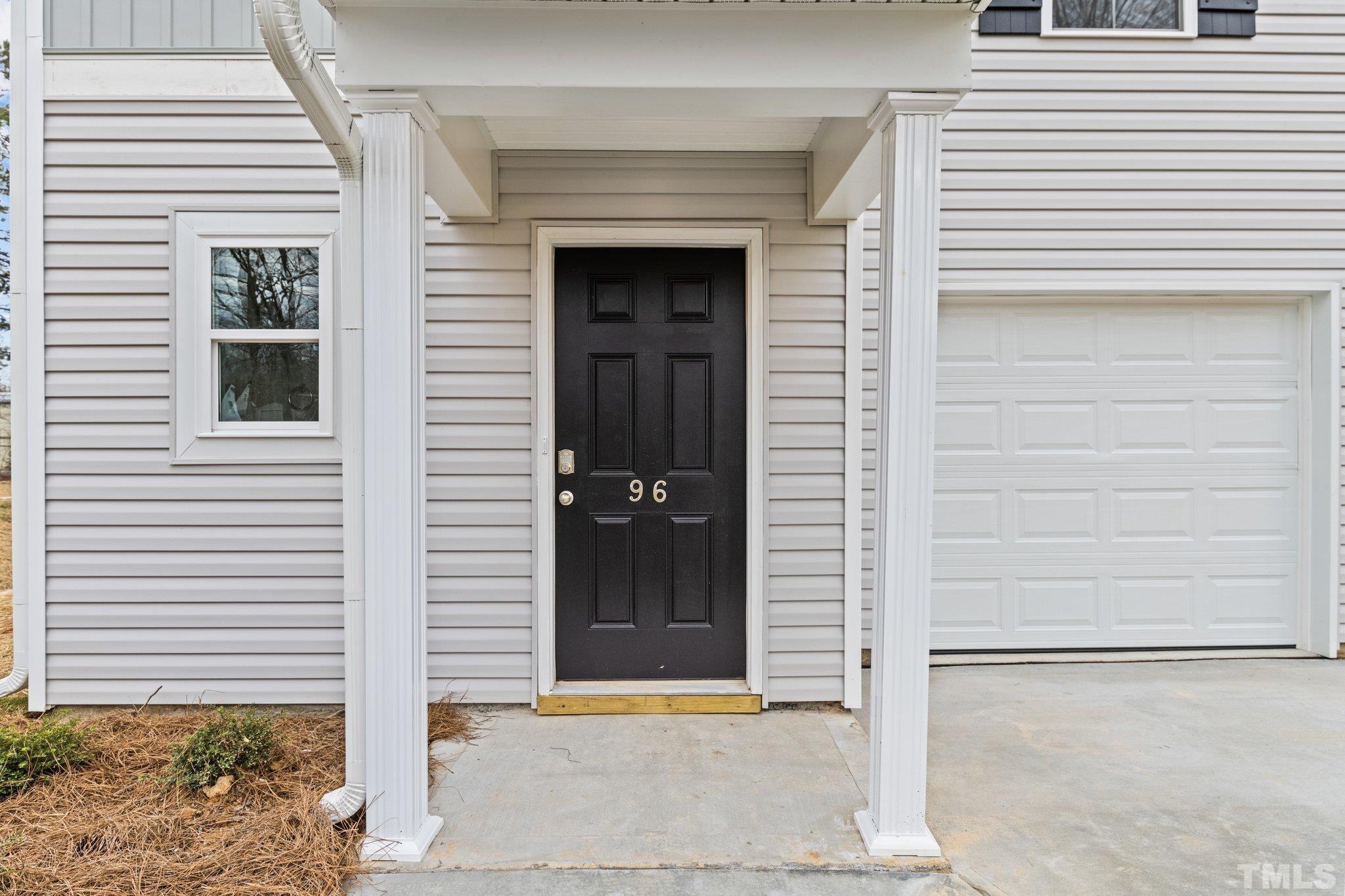 96 Somerset Drive Roxboro, NC 27573 - Photo 4 of 29 a view of entrance door of the house