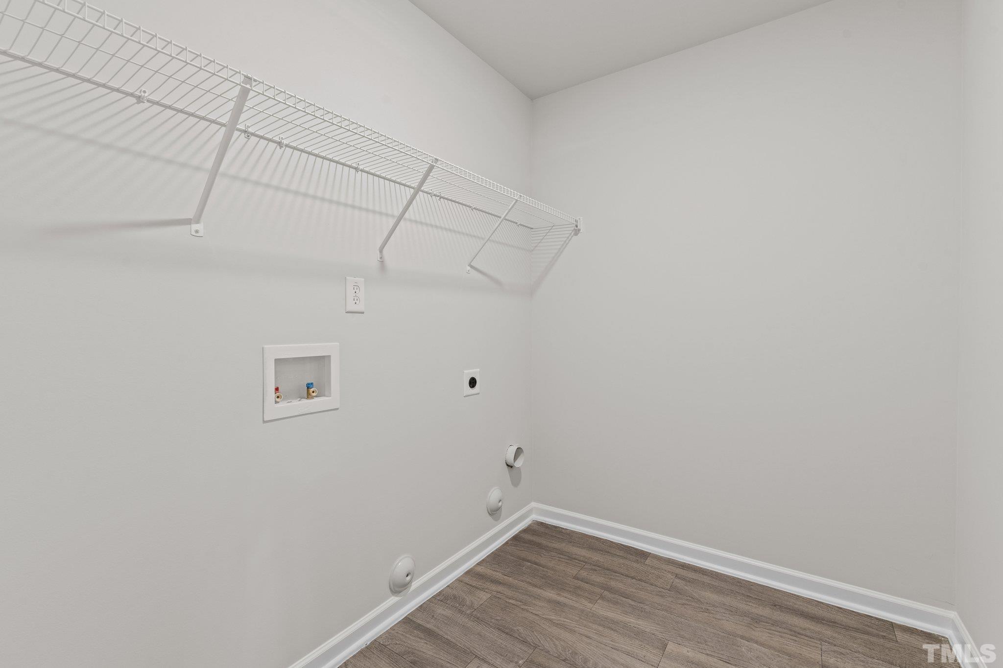 96 Somerset Drive Roxboro, NC 27573 - Photo 8 of 29 a view of a room with wooden floor