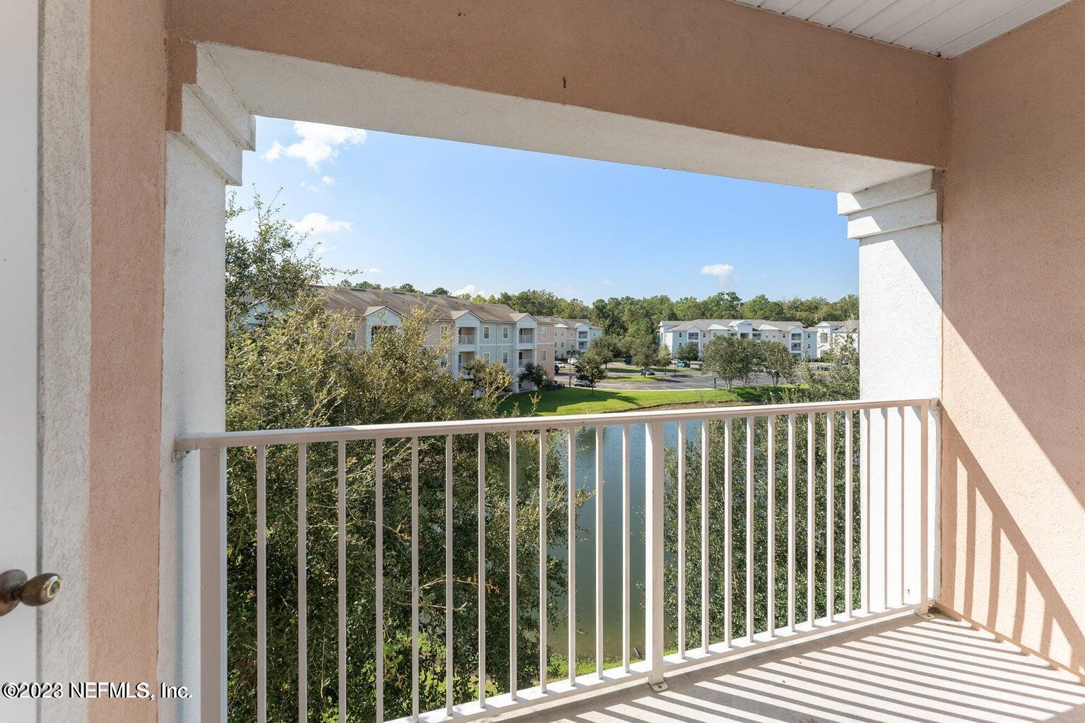 8226 Green Parrot Road, Unit 308 Jacksonville, FL 32256 - Photo 5 of 31 a view of a balcony