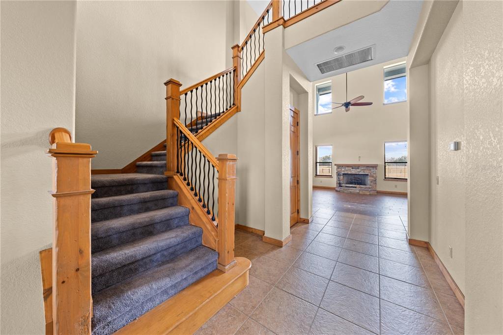 3911 Story Road St. Cloud, FL 34772 - Photo 46 of 97 a view of entryway and hall with wooden floor