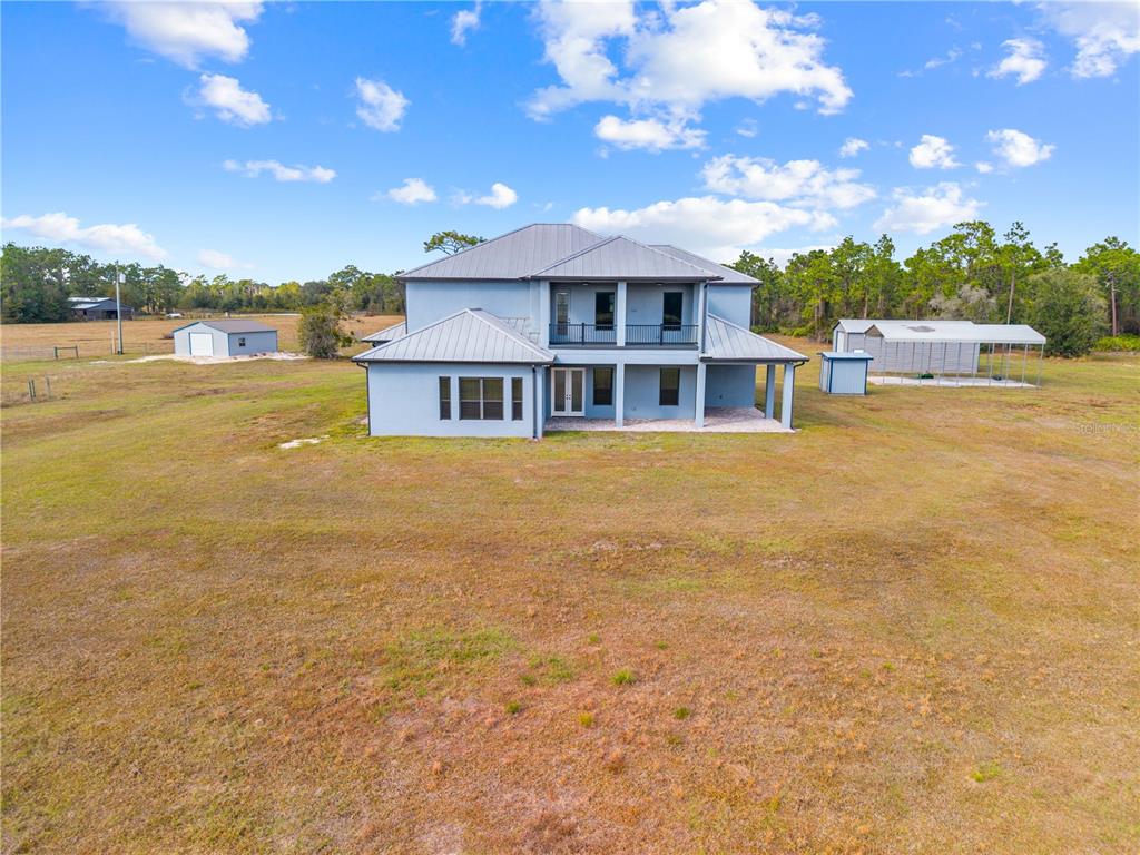 3911 Story Road St. Cloud, FL 34772 - Photo 71 of 97 a view of a house with a ocean view