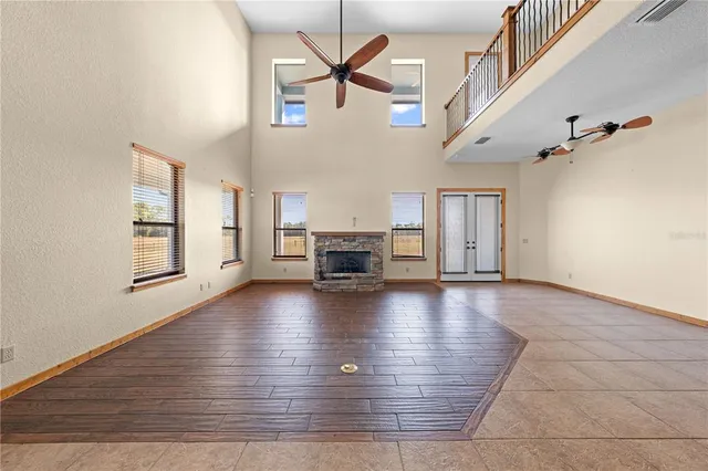 a kitchen with stainless steel appliances granite countertop a stove a sink dishwasher and a refrigerator