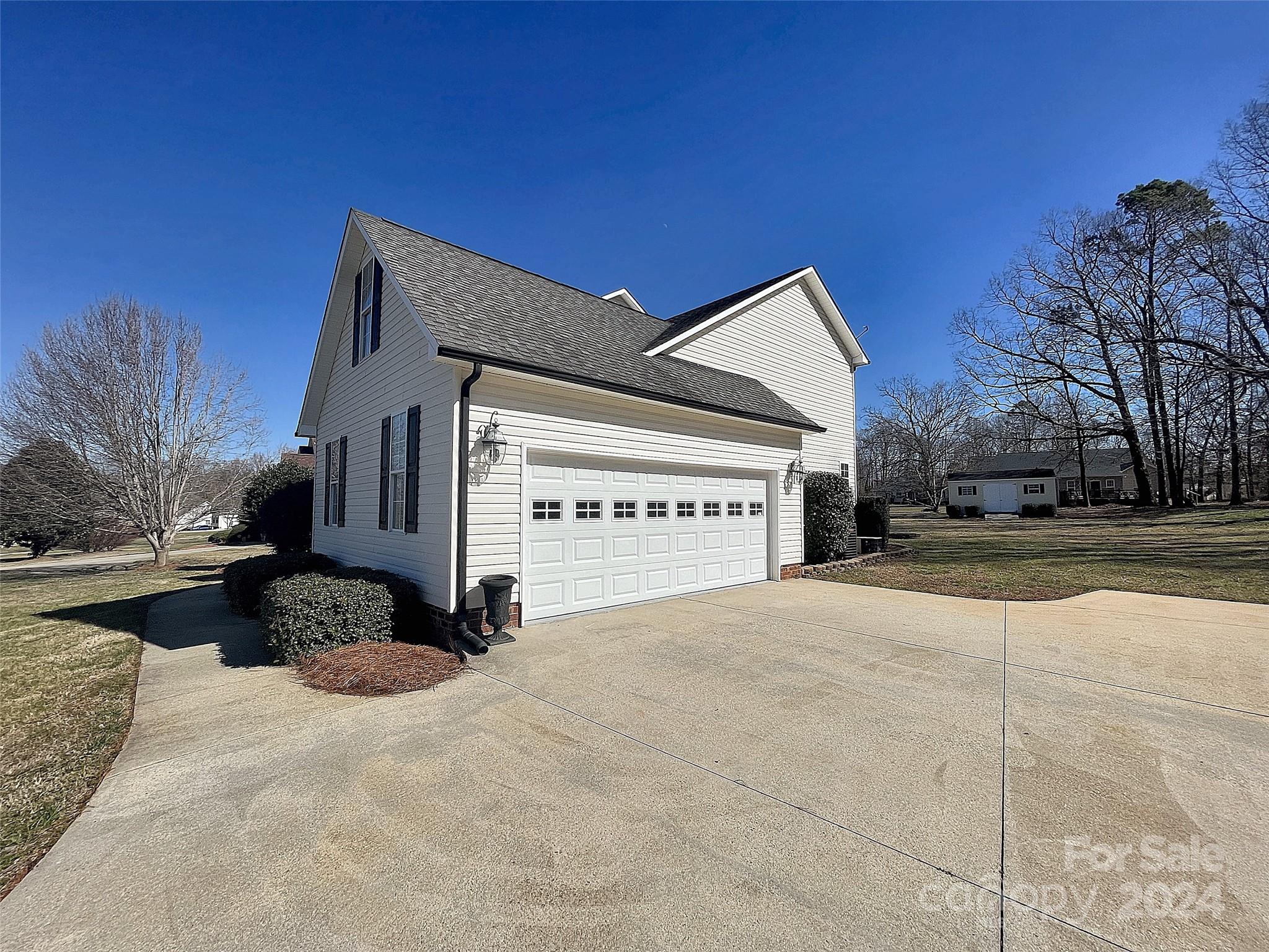 251 Maple Ridge Circle Salisbury, NC 28147 - Photo 2 of 20 a view of a house with snow on the road
