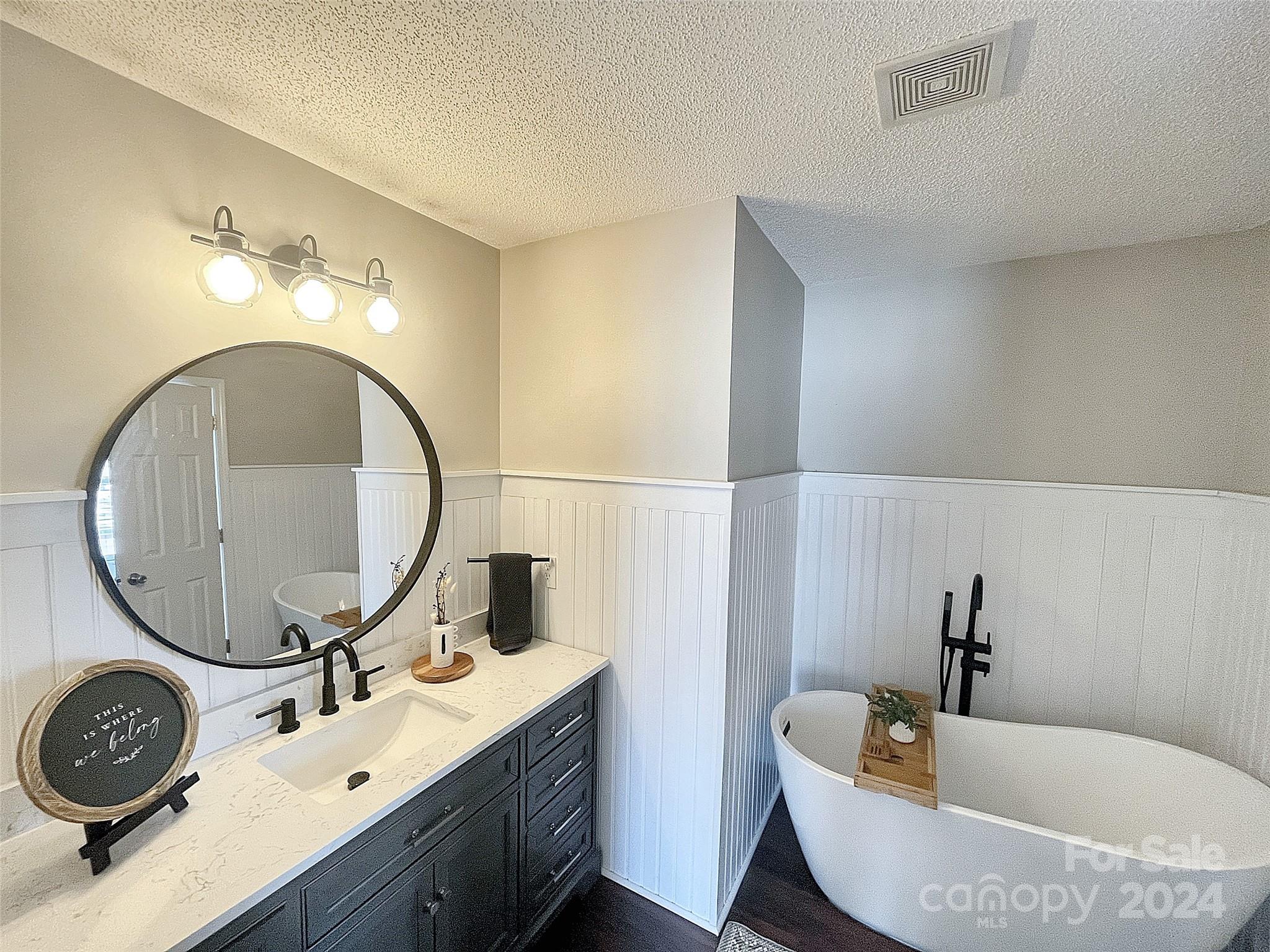 251 Maple Ridge Circle Salisbury, NC 28147 - Photo 10 of 20 a bathroom with a toilet a sink and a mirror