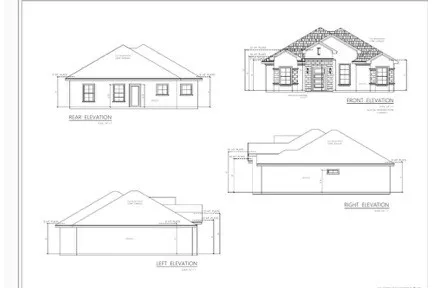 a black and white photo of a living room