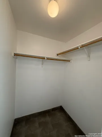 a view of a room with racks on the wall