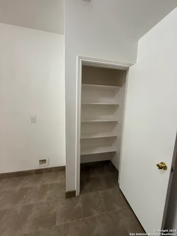 a view of room with walk in closet