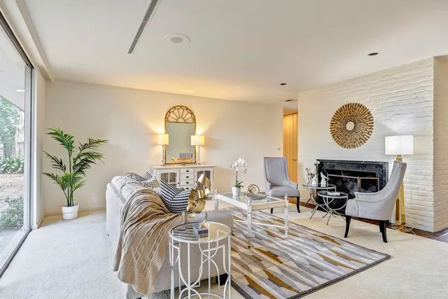 a view of a livingroom with furniture