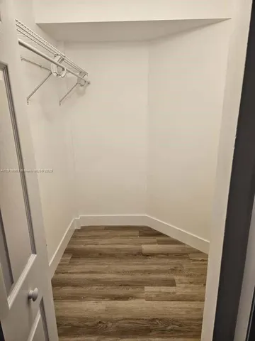 a view of a room with racks on the wall