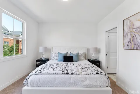 a bathroom with a granite countertop sink a mirror a vanity and shower