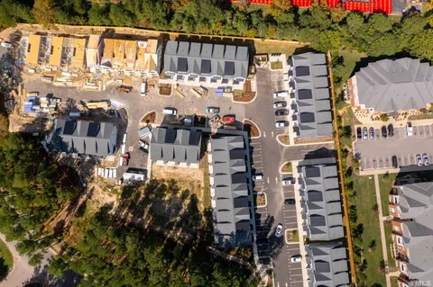 a view of a house with a small yard