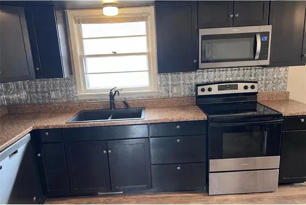 $245,000 | 502 Northeast Ash Street, Lee's Summit, MO 64063