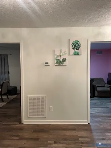 a view of livingroom with furniture and wooden floor