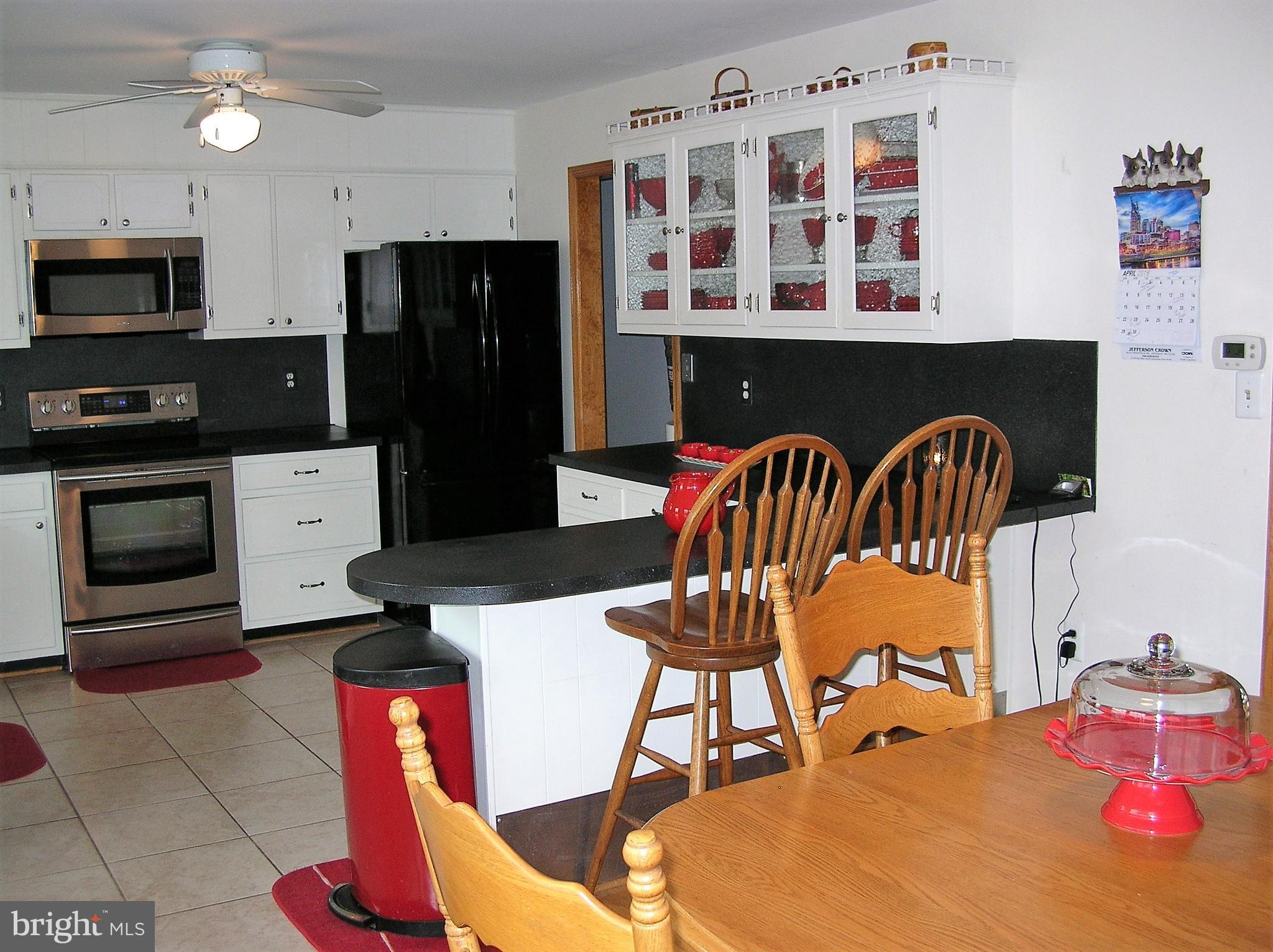 4215 Spring View Court Jefferson, MD 21755 - Photo 12 of 23 Kitchen features a breakfast bar