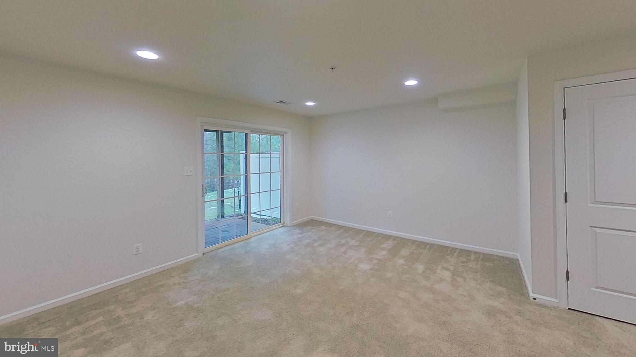23340 Starry Way California, MD 20619 - Photo 15 of 18 a view of an empty room with a window