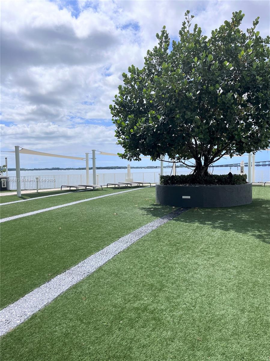 200 Southeast 15th Road, Unit 6A Miami, FL 33129 - Photo 12 of 14 a view of a garden with a sitting area