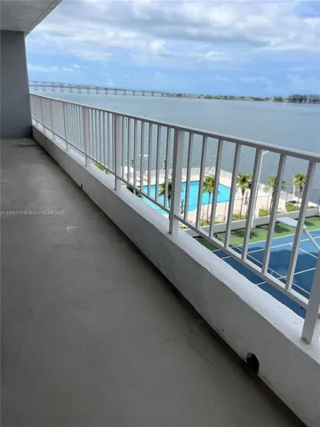 a balcony with a city view