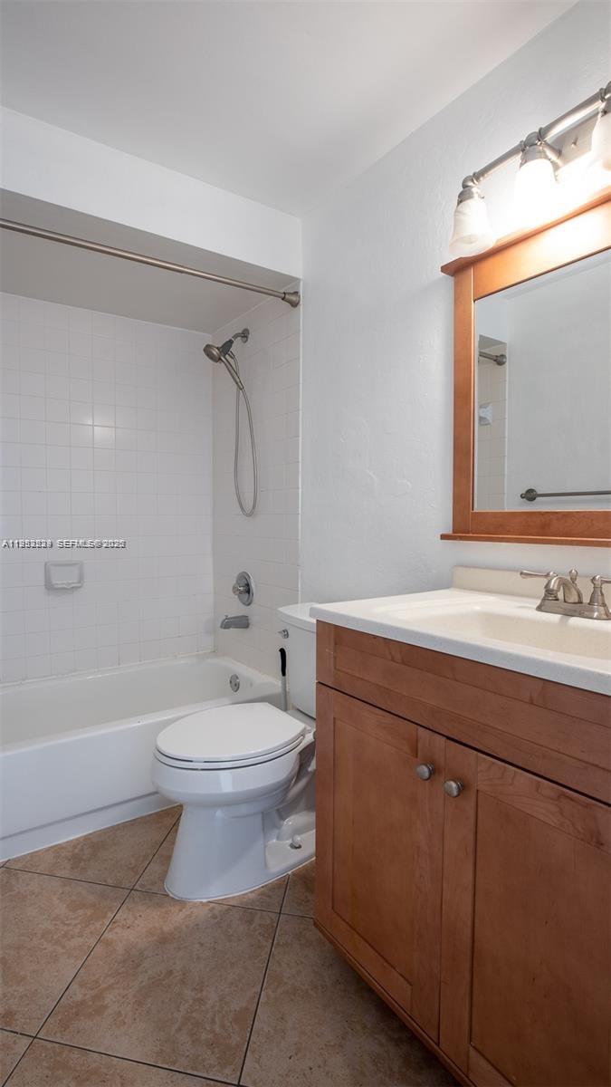 14206 Southwest 97th Terrace Miami, FL 33186 - Photo 20 of 33 a bathroom with a sink a toilet and shower