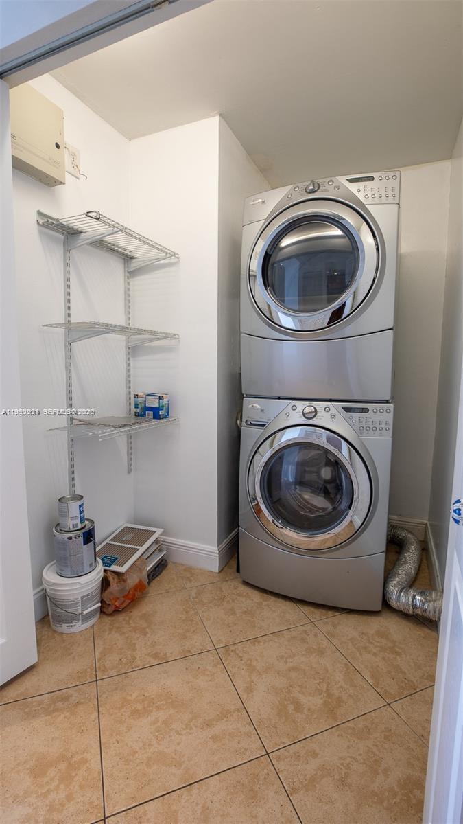 14206 Southwest 97th Terrace Miami, FL 33186 - Photo 22 of 33 a utility room with dryer and washer