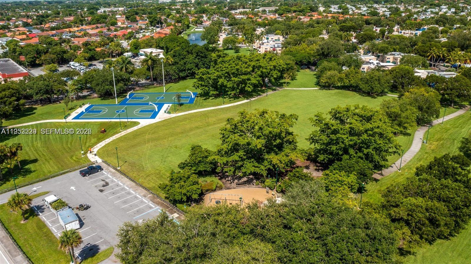 14206 Southwest 97th Terrace Miami, FL 33186 - Photo 25 of 33 an aerial view of a residential houses with outdoor space and trees
