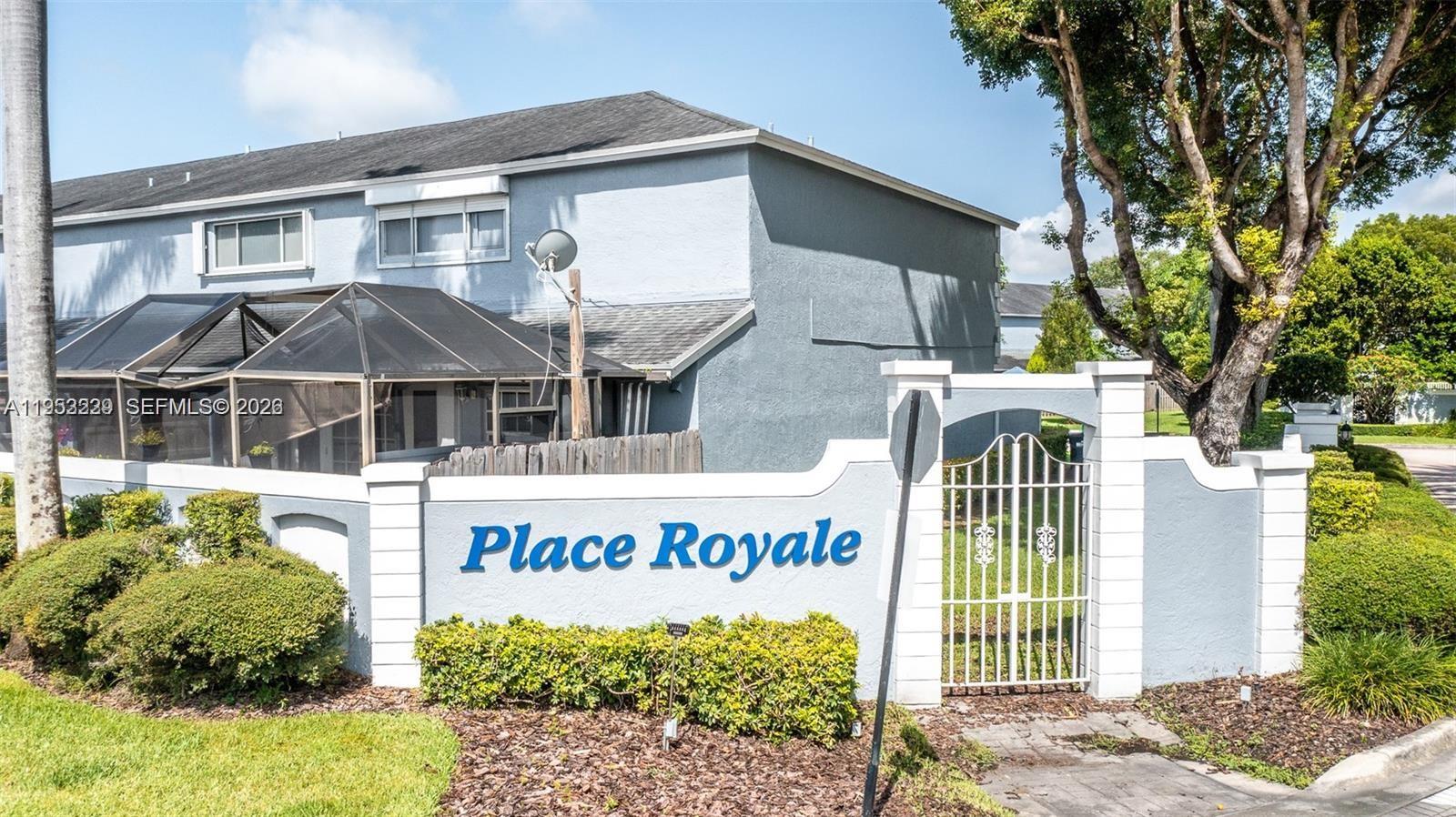 14206 Southwest 97th Terrace Miami, FL 33186 - Photo 33 of 33 a front view of a building with garden