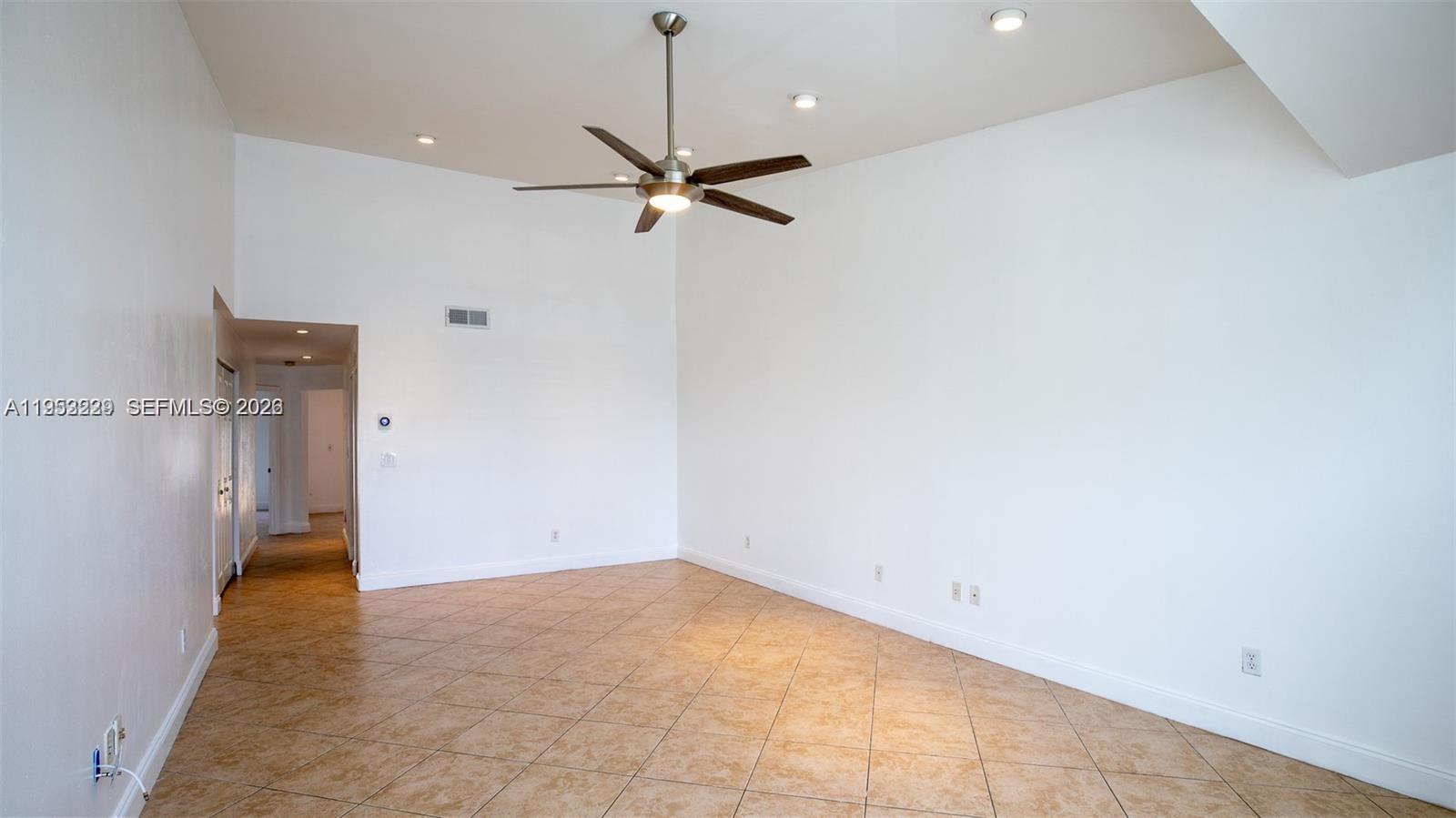 14206 Southwest 97th Terrace Miami, FL 33186 - Photo 4 of 33 a view of empty room