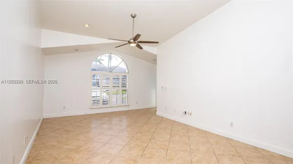 a view of an empty room and window