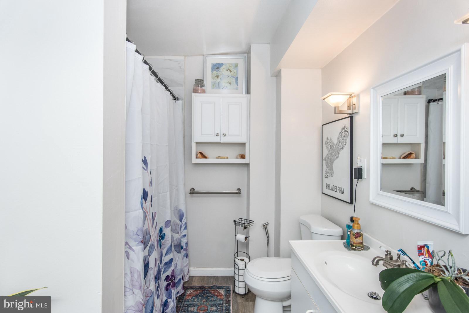 2240 Brill Street Philadelphia, PA 19137 - Photo 18 of 26 a bathroom with a sink toilet and shower