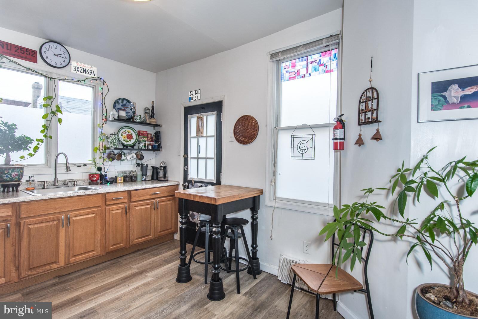 2240 Brill Street Philadelphia, PA 19137 - Photo 10 of 26 a kitchen with a table and chairs in it
