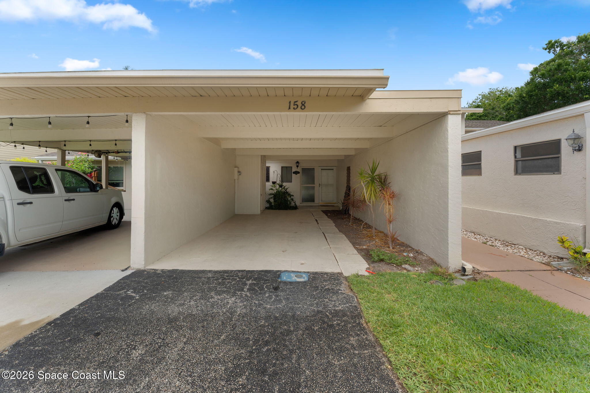 158 Augusta Way Melbourne, FL 32940 - Photo 2 of 29 CAR PORT