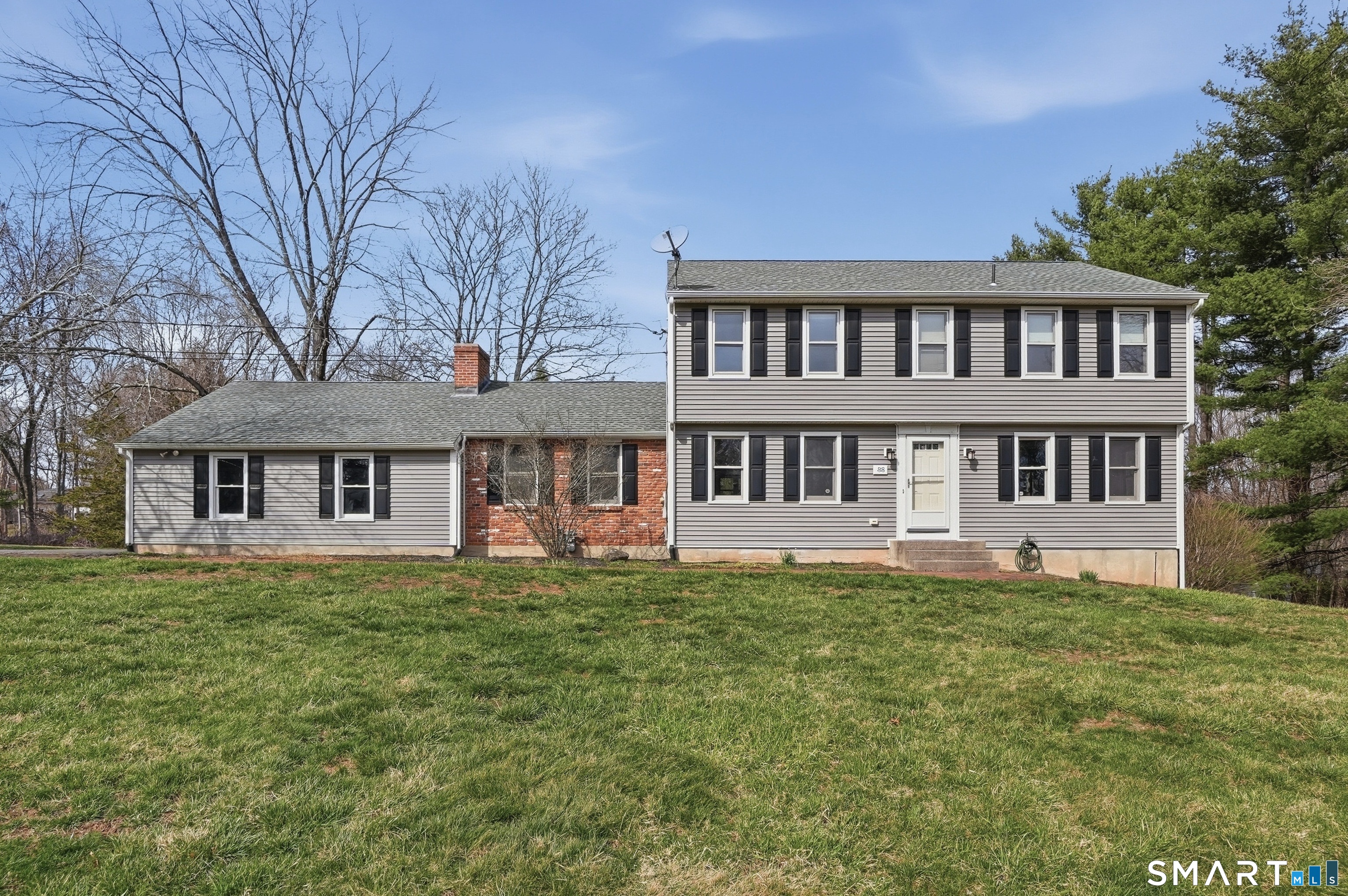 88 Nob Hill Road Cheshire, CT 06410 - Photo 2 of 40 a view of a house with a yard