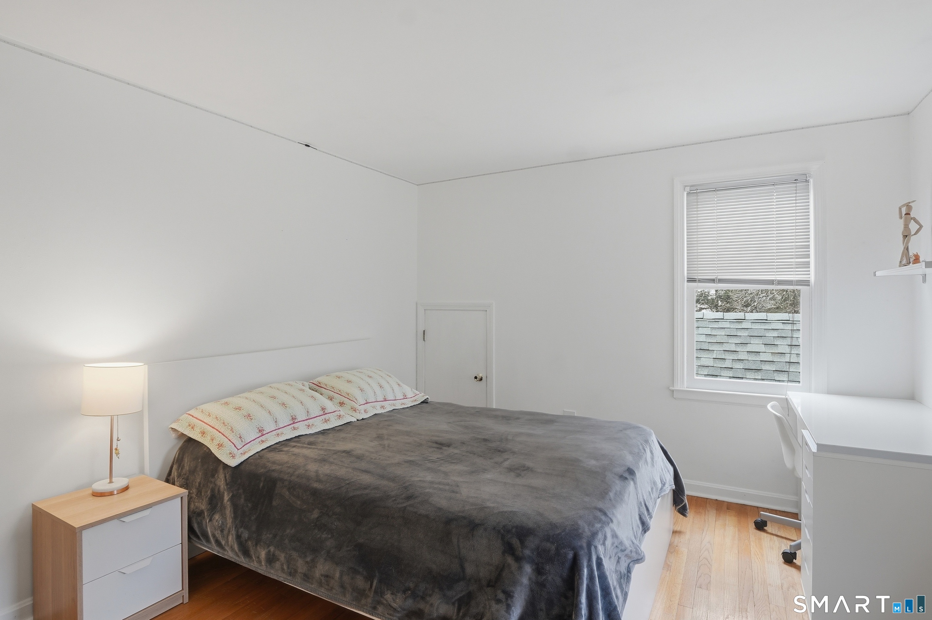 88 Nob Hill Road Cheshire, CT 06410 - Photo 29 of 40 a bedroom with a bed and a window
