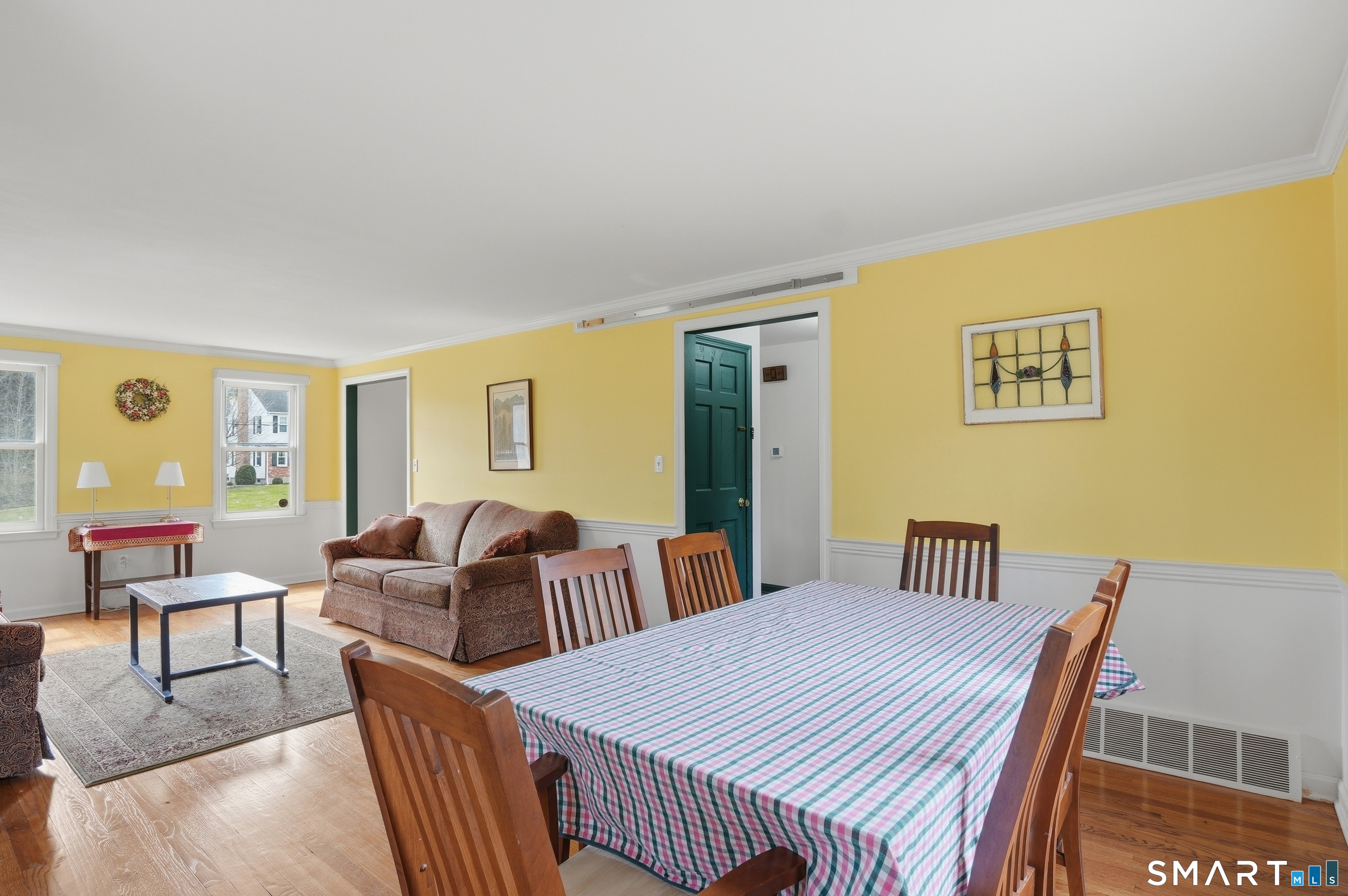 88 Nob Hill Road Cheshire, CT 06410 - Photo 8 of 40 a bedroom with a bed and wooden floor