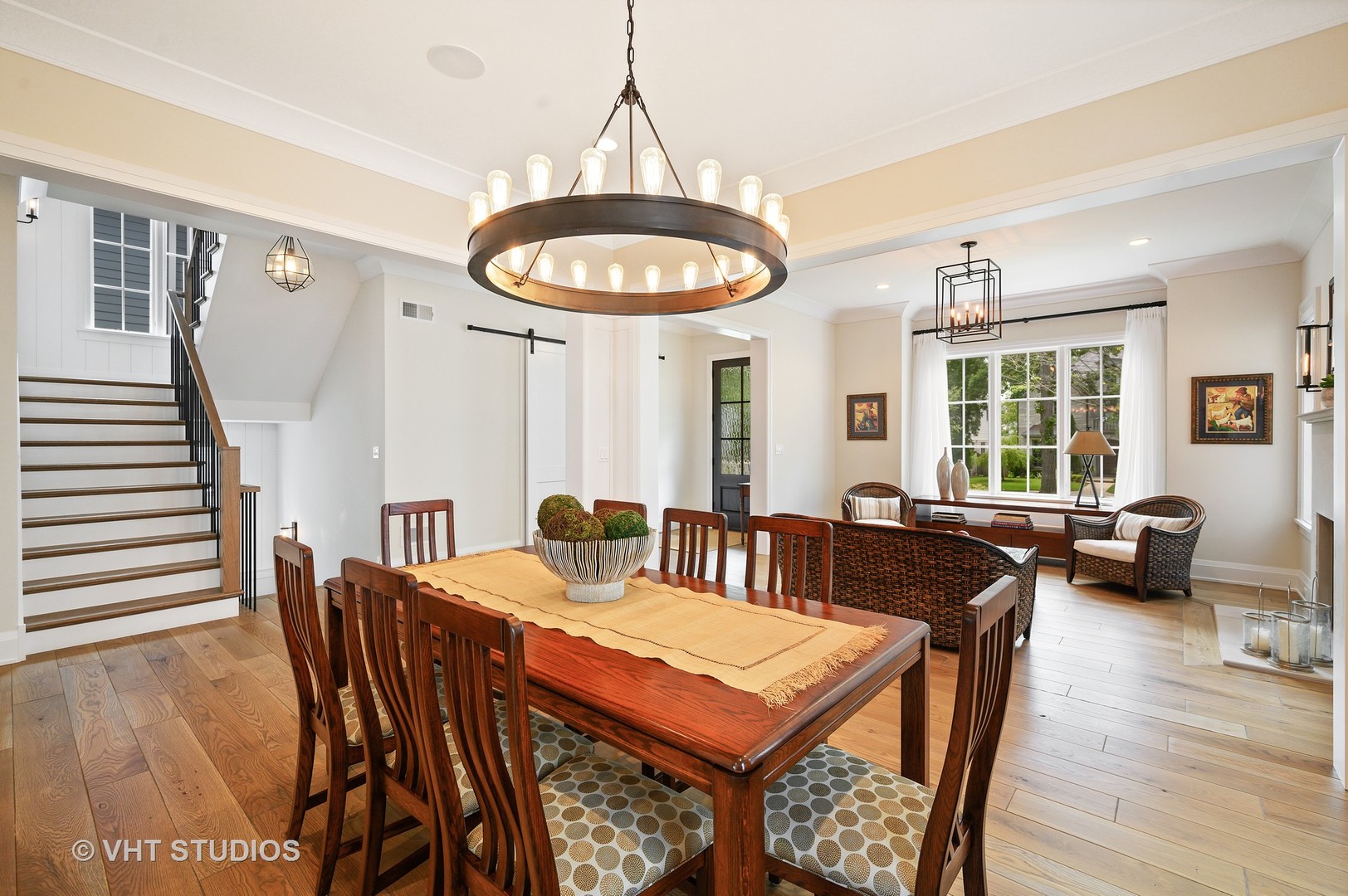 1025 Oak Street Winnetka, IL 60093 - Photo 12 of 38 a view of a dining room with furniture and wooden floor