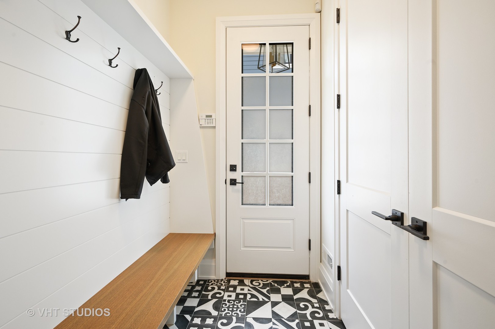 1025 Oak Street Winnetka, IL 60093 - Photo 15 of 38 a view of walk in closet with clothes and shoes