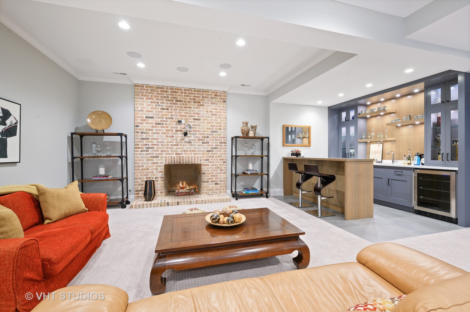 1025 Oak Street Winnetka, IL 60093 - Photo 26 of 38 a living room with furniture and a fireplace