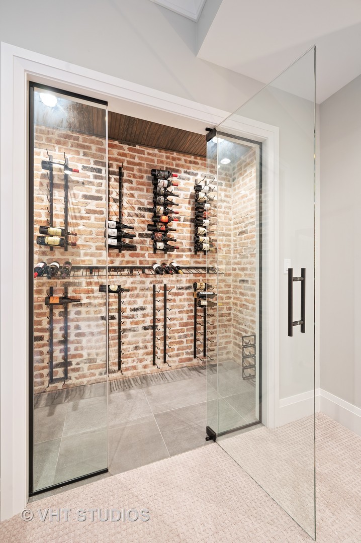 1025 Oak Street Winnetka, IL 60093 - Photo 28 of 38 a bathroom with a shower