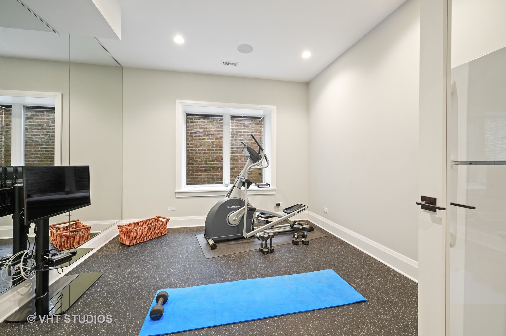 1025 Oak Street Winnetka, IL 60093 - Photo 29 of 38 a view of a room with gym equipment