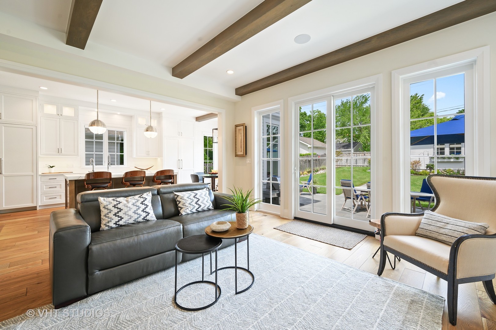 1025 Oak Street Winnetka, IL 60093 - Photo 6 of 38 a living room with furniture and floor to ceiling windows