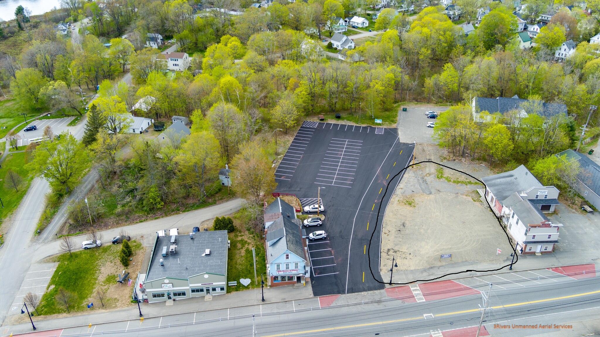 64-68 Main Street Milo, ME 04463 - Photo 2 of 13 AerailParkingLot2-1
