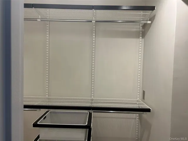 a bathroom with a shower and toilet