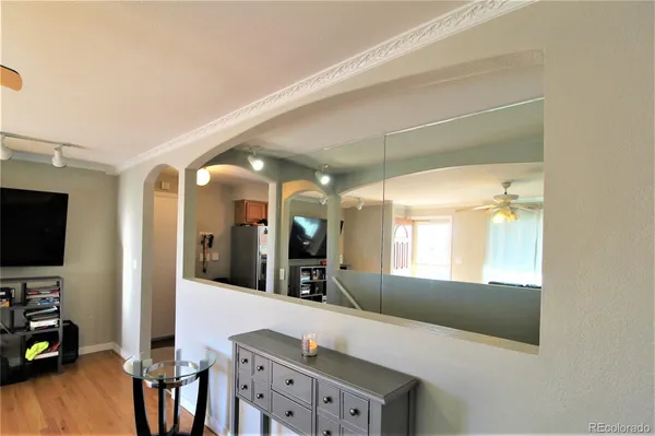 a view of a living room and dining room