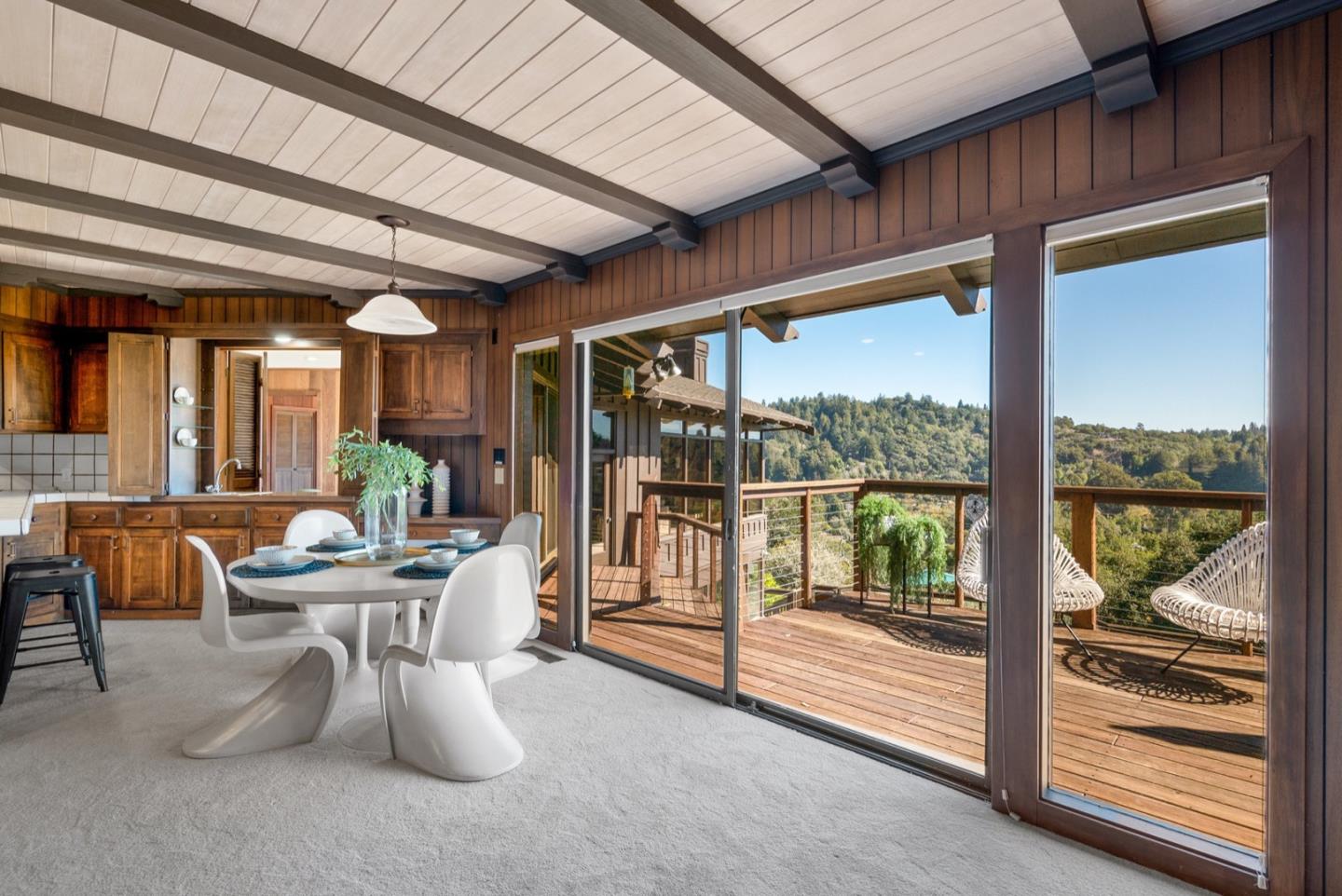 390 Rancho Soquel Drive Soquel, CA 95073 - Photo 31 of 97 a dining room with furniture and a floor to ceiling window