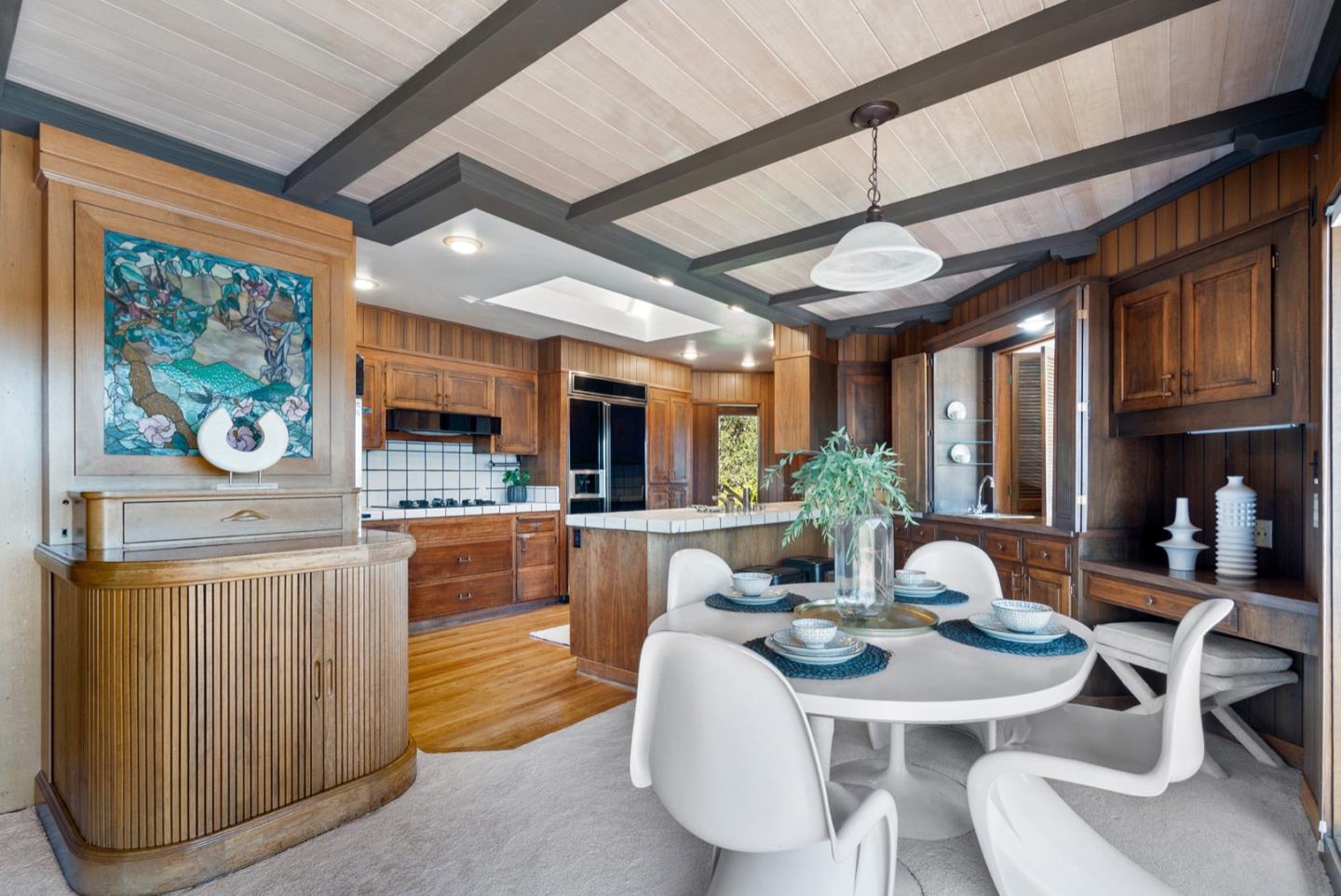 390 Rancho Soquel Drive Soquel, CA 95073 - Photo 34 of 97 a view of a dining room with furniture one side kitchen view and wooden floor