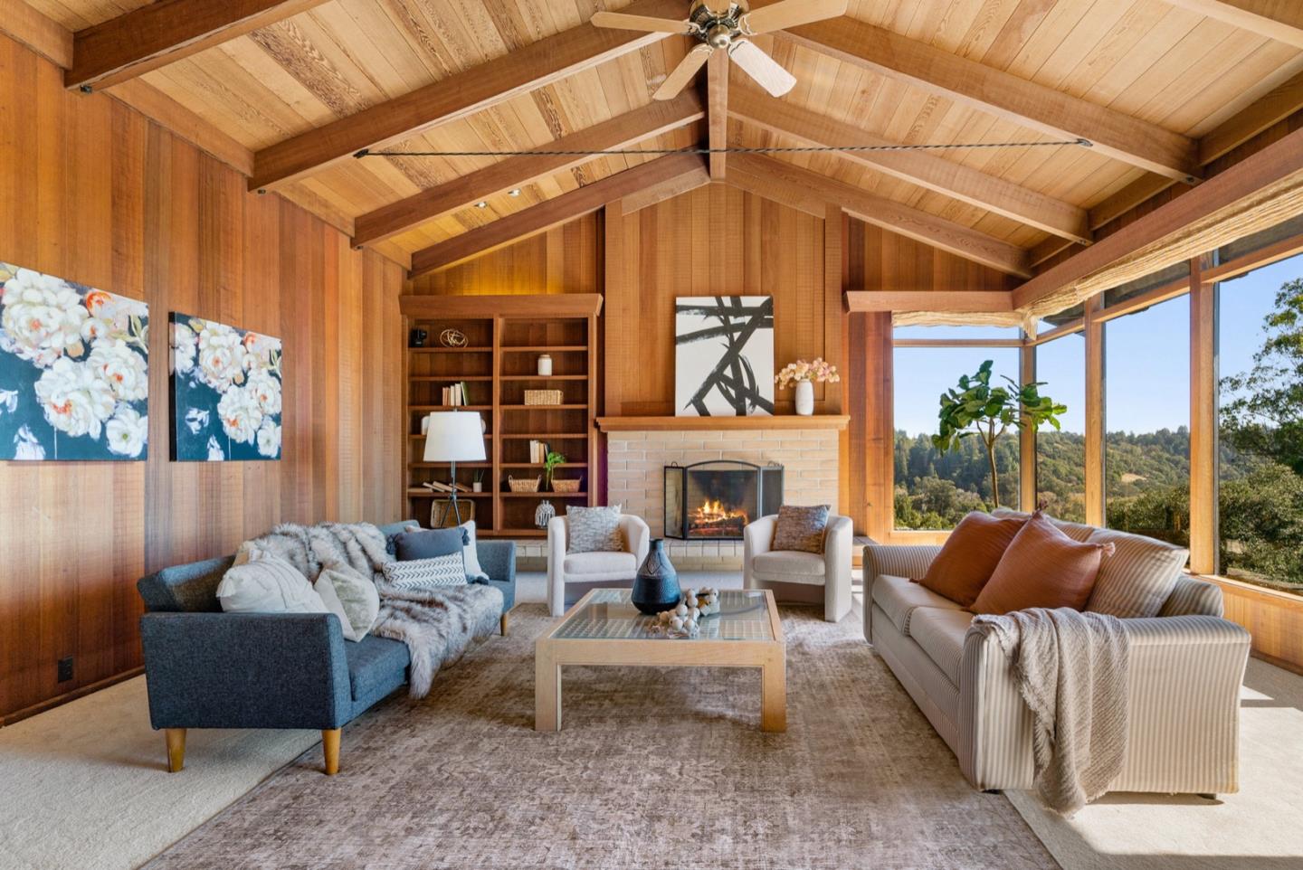 390 Rancho Soquel Drive Soquel, CA 95073 - Photo 4 of 97 a living room with furniture a fireplace and a window