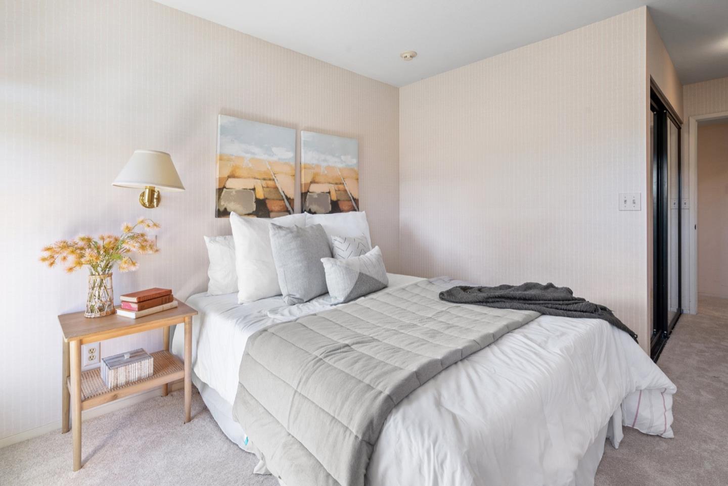 390 Rancho Soquel Drive Soquel, CA 95073 - Photo 53 of 97 a bedroom with a bed and a painting on the wall